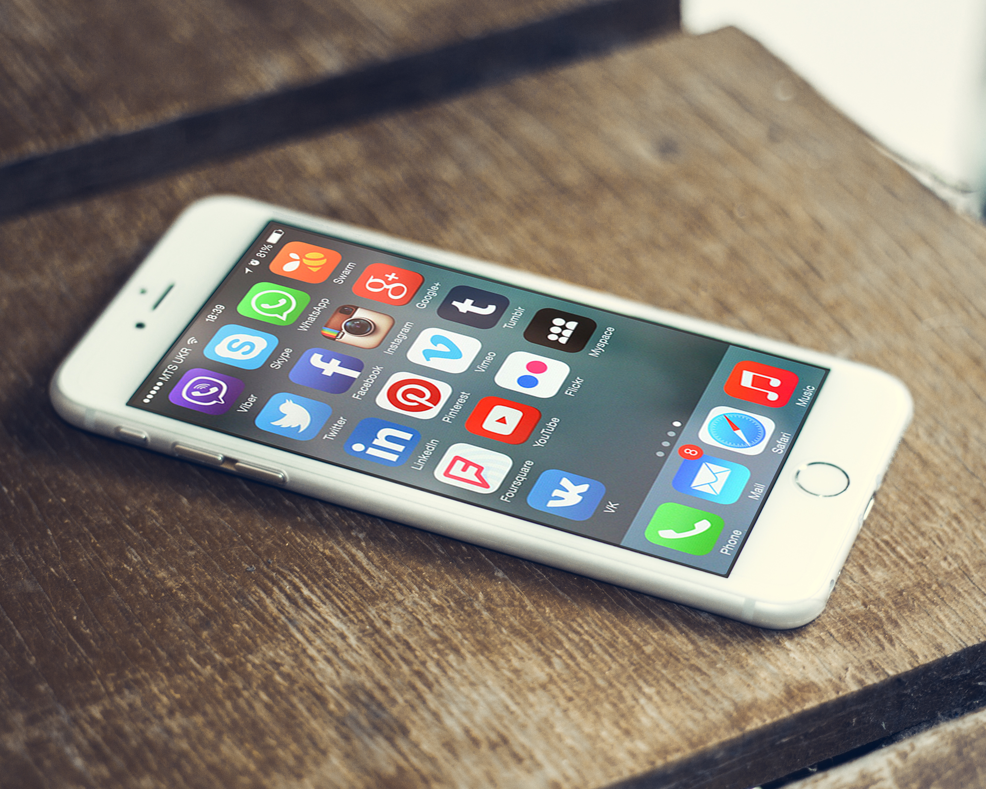 Social app icons on a phone screen.